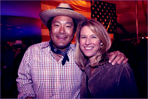 Image of Caption: Chef Ming Tsai posing with wife, Polly