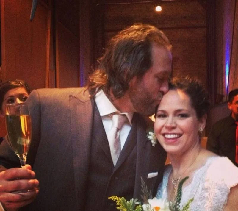 Stephanie Izard and her beloved husband in their wedding