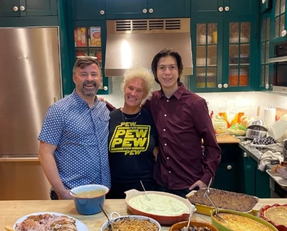 Image of Anne Burrell and Stuart Claxton, and their son, Javier