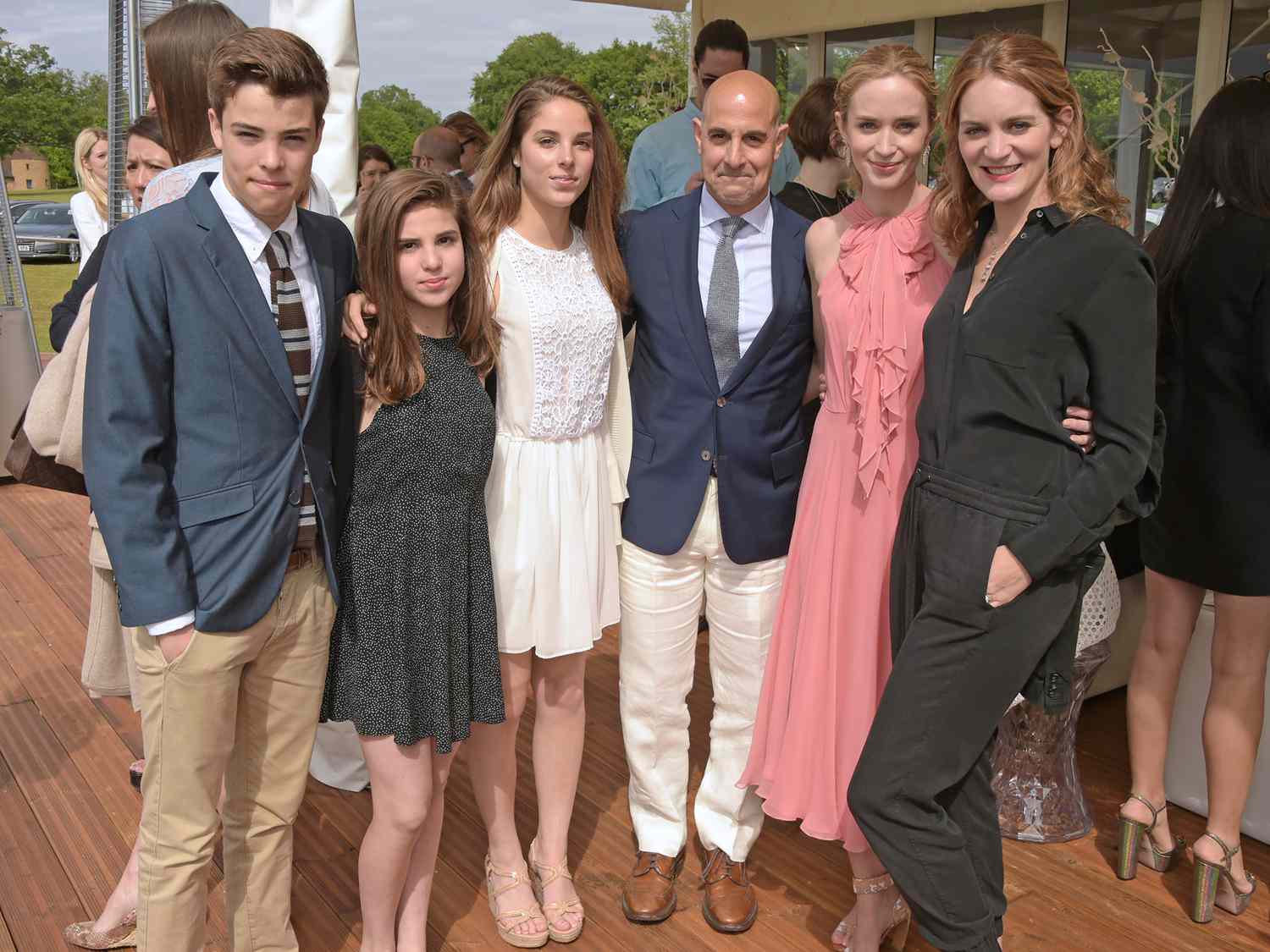 Image of stanley Tucci, his wife Felicity Blunt and their children